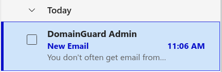 In the Outlook message list, only the display name DomainGuard Admin is visible. The gmail.com address behind it stays hidden until the message is opened.